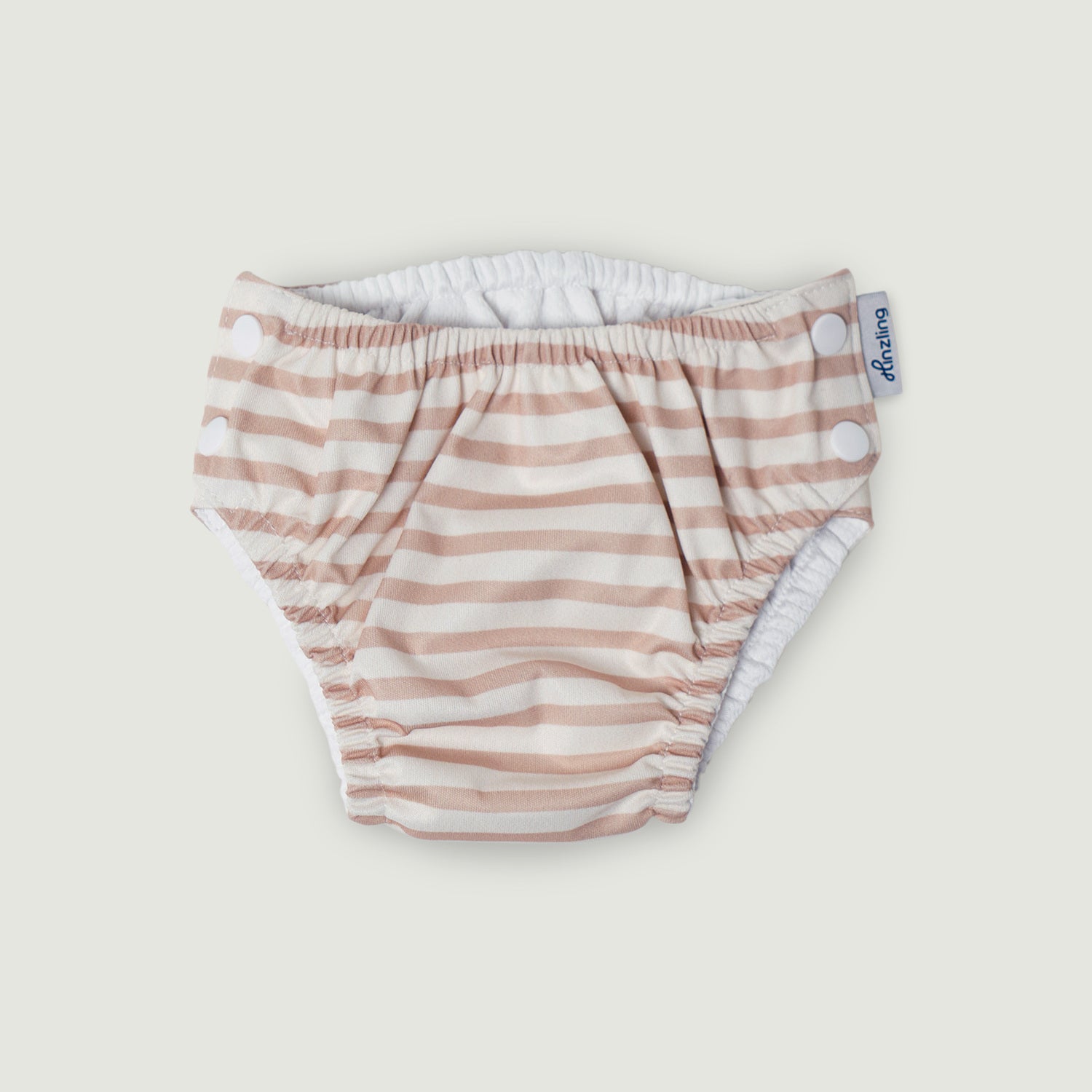 Schwimmwindel mit beige, weißen Streifen als Farbmuster auf weißem Hintergrund